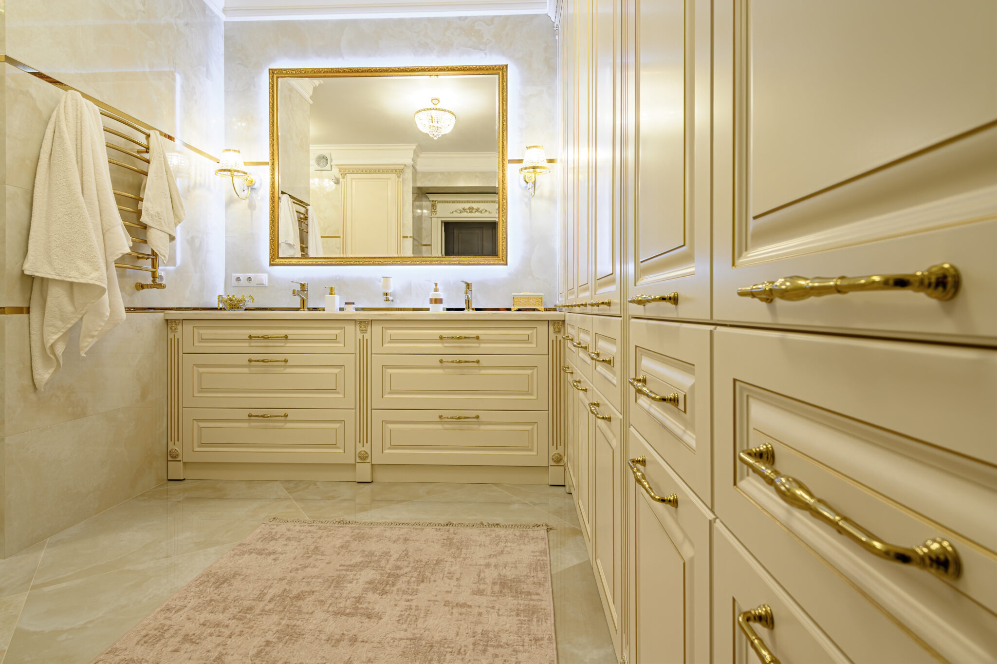 Modern luxury beige and golden bathroom with mirror and large closet